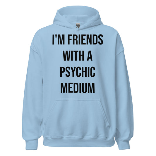 Friends With A Psychic Medium Unisex Hoodies in Light Blue – front view with bold black block letter print "I'M FRIENDS WITH A PSYCHIC MEDIUM" | JAMILLIAH'S WISDOM IS TIMELESS SHOP