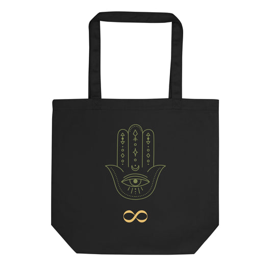 Black organic eco tote bag featuring olive green Hamsa hand with all-seeing eye and gold infinity symbol — JAMILLIAH'S WISDOM IS TIMELESS SHOP